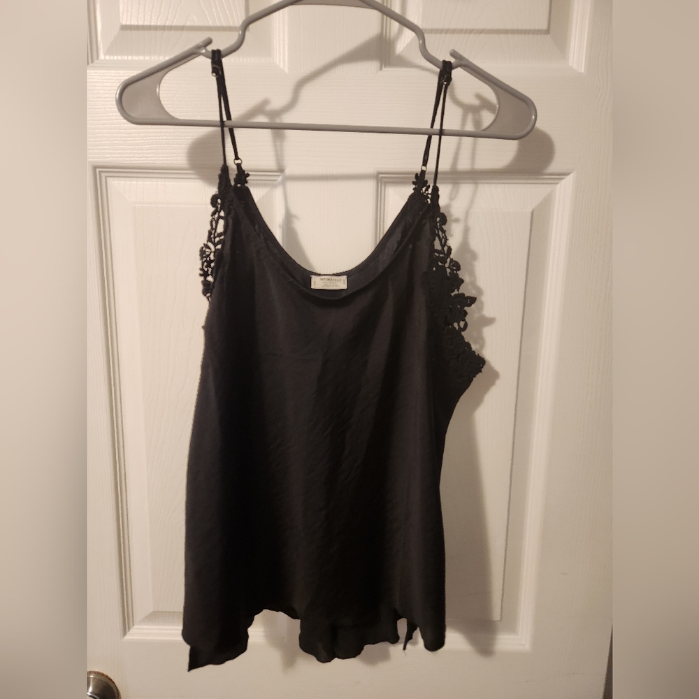 Black dressy tank top with decoration by arm holes